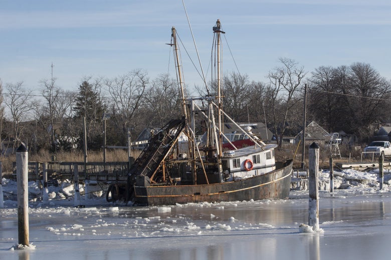ORLEANS, MA - JANUARY 03: Sea ice surrounds a boat in Rock Harbor on January 3, 2018 in Orleans, Massachusetts, A winter storm is hitting the east coast from Florida to New England bringing snow and frigid temperatures. (Photo by Scott Eisen/Getty Images)